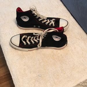 Converse All Star high top tennis shoe.